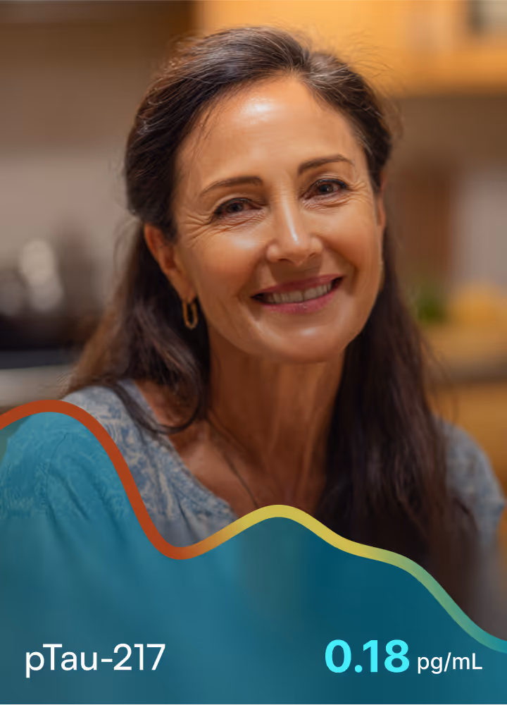 Smiling middle-aged woman with long dark hair, with text overlay showing pTau-217 level at 0.18 pg/mL.